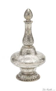 TIFFANY & CO STERLING SILVER BOTTLE WITH STOPPER, C 1912 H 9": TIFFANY & CO STERLING SILVER BOTTLE WITH STOPPER, C 1912 H 9" Urn shape, embellished with chased designs of flower baskets, classic urns, ribbons in bow forms. Fitted stopper. Impressed signature.
