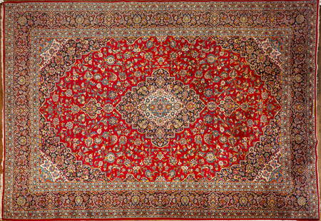 PERSIAN KESHAN ORIENTAL CARPET W 10' L 14': PERSIAN KESHAN ORIENTAL CARPET W 10' L 14' Red field, navy medallion border and center medallion. Length 13'11". Circa 1950. Provenance: Property of a Grosse Pointe, MI collector.