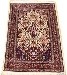 KESHAN PERSIAN HAND WOVEN PRAYER CARPET C. 1950 W 4'7" L 6'9": KESHAN PERSIAN HAND WOVEN PRAYER CARPET C. 1950 W 4'7" L 6'9" All wool. Prayer niche in ivory tones, burgundy border. Finely woven motif of urns and flowers. Provenance: Property of a Bloomfield