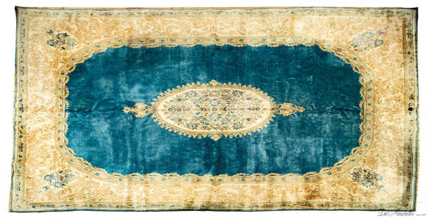 PERSIAN KERMAN HANDWOVEN WOOL RUG, W 10', L 16': PERSIAN KERMAN HANDWOVEN WOOL RUG, W 10', L 16' Finely woven, having a turquoise field with a beige central medallion and outer border.