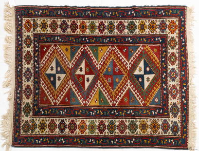 CAUCASIAN KAZAK HANDWOVEN WOOL RUG, W 4' 3", L 6' 6": CAUCASIAN KAZAK HANDWOVEN WOOL RUG, W 4' 3", L 6' 6" Latch hook and diamond forms. Bright colors. Provenance: Property of a Clinton Twp., Mi estate