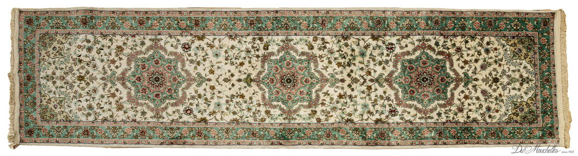 SINO-PERSIAN SILK RUNNER, W 2' 6", L 10' 3": SINO-PERSIAN SILK RUNNER, W 2' 6", L 10' 3" Finely woven with a cotton fringe. Ivory ground with green central medallions and outer border.