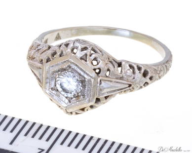 DIAMOND AND 14KT WHITE GOLD ENGAGEMENT RING, SIZE 5 1/2 C 1910 DREICER & CO: DIAMOND AND 14KT WHITE GOLD ENGAGEMENT RING, SIZE 5 1/2 C 1910 DREICER & CO 2.4 gr. TW. Approx. 10 pt mine cut diamond. Shank impressed "Dreicer".