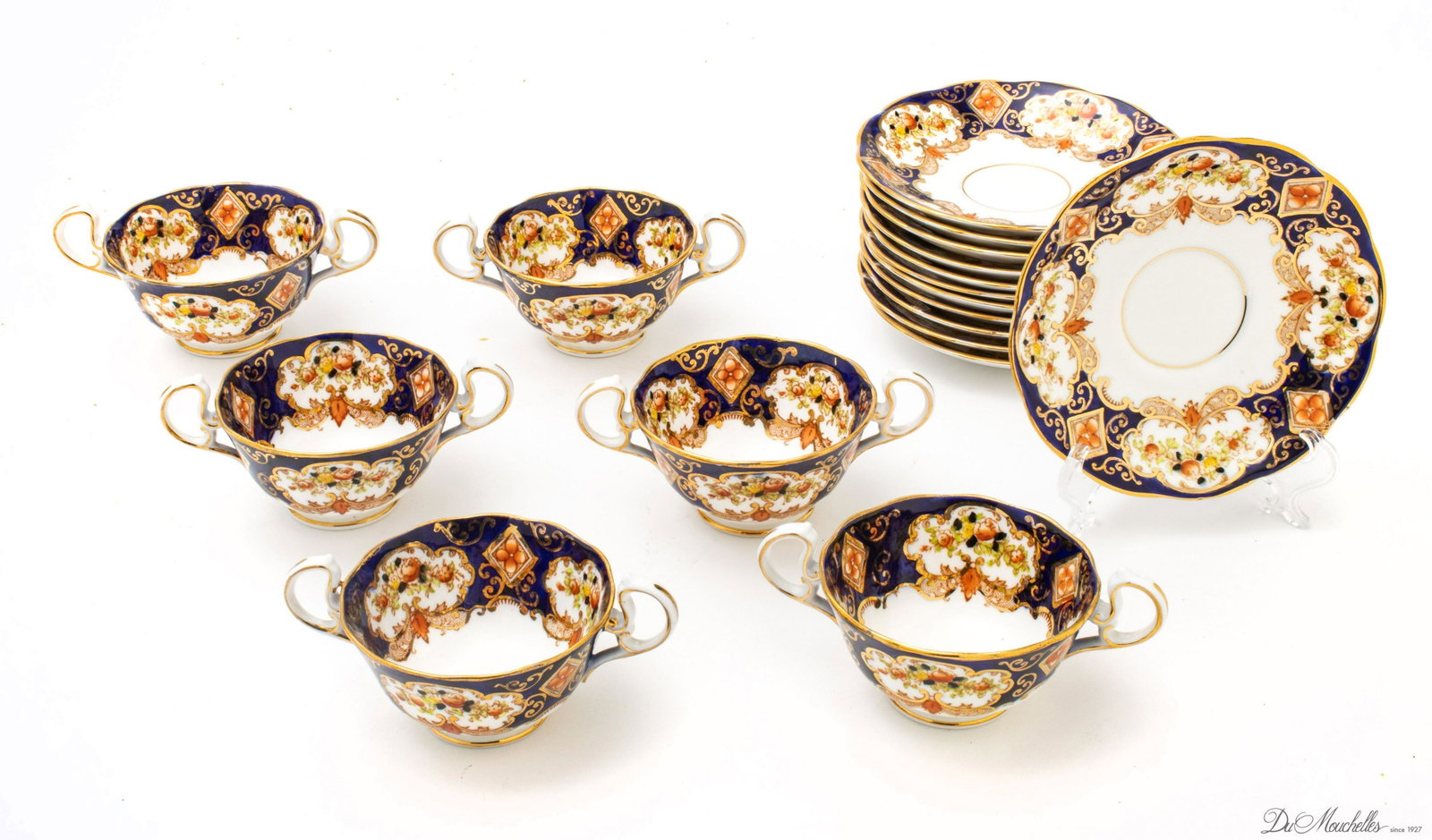 ROYAL ALBERT "IMARI" CROWN CHINA CREAM SOUP CUPS SAUCERS, SET OF SIX: ROYAL ALBERT "IMARI" CROWN CHINA CREAM SOUP CUPS SAUCERS, SET OF SIX Six cups, 12 saucers. Cobalt blue with floral reserves for six.