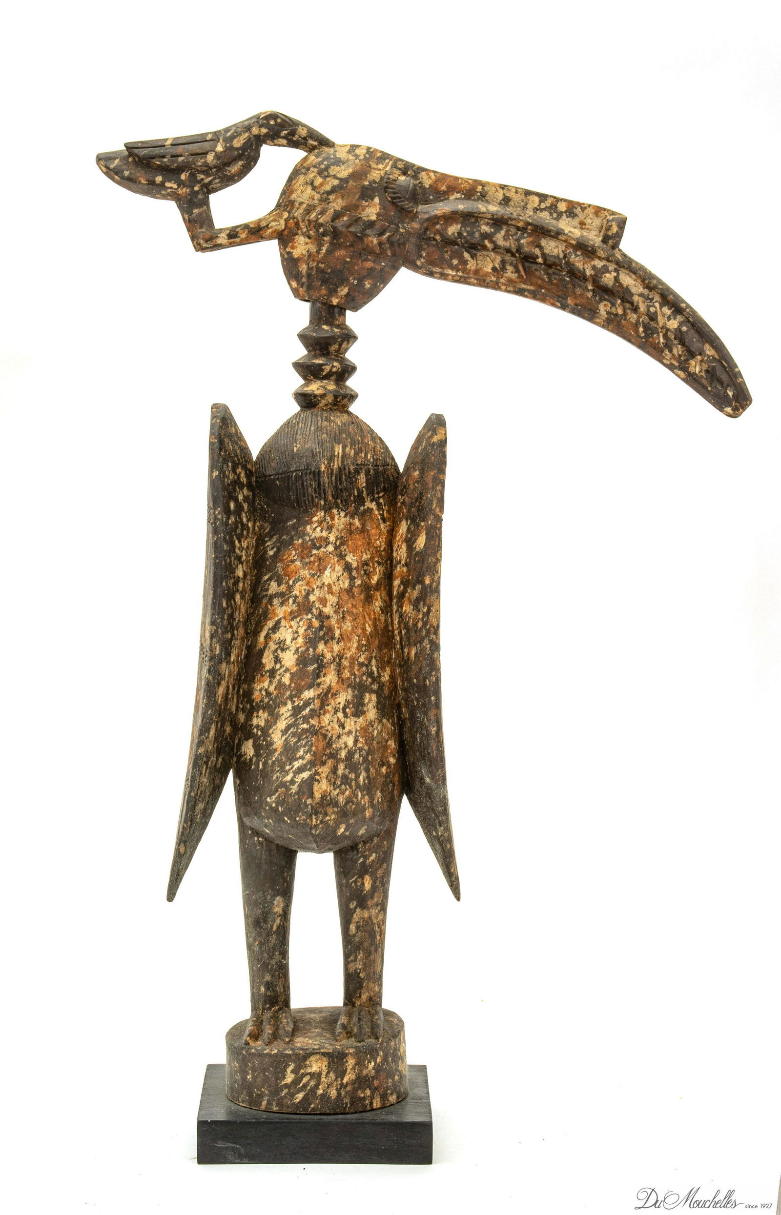 AFRICAN CARVED WOOD BIRD FIGURE, H 30.5", L 20": AFRICAN CARVED WOOD BIRD FIGURE, H 30.5", L 20" Depth 6". With base, measures H 32" x L 20" x D 7" overall. Provenance: property of an Ann Arbor, MI estate.