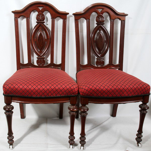 TRANSITIONAL STYLE MAHOGANY SIDE CHAIRS, C1920: TRANSITIONAL STYLE MAHOGANY SIDE CHAIRS, C1920, PAIR:Back splats with center oval with curved upper back frame. Rust to red upholstery. Porcelain casters.
