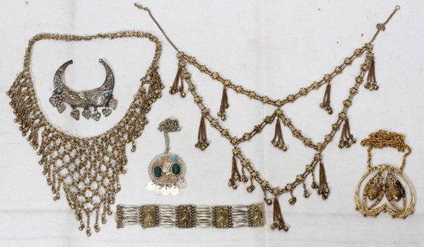 EGYPTIAN PENDANTS, MIDDLE EASTERN NECKLACES,: EGYPTIAN PENDANTS, MIDDLE EASTERN NECKLACES, MEXICAN BRACELET 5 PCS.:Two pendants with Queen Nefertiti profiles, two harem necklaces with multiple strands and tassels, bracelet marked Mexico and "silv
