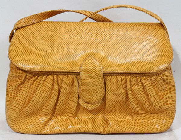 JUDITH LEIBER MUSTARD SNAKE SKIN BAG W/STRAP,: JUDITH LEIBER MUSTARD SNAKE SKIN BAG WITH SHOULDER STRAP, L 11":Mustard color bag with magnetic close. Dimensions are approximately H. 7", W. 11", D. 3 1/2"; overall measurement with shoulder strap is