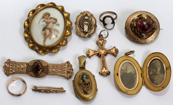 VICTORIAN BROOCHES, LOCKETS, PENDANT & RING: VICTORIAN BROOCHES (5), LOCKETS (2), PENDANT & RING:Porcelain brooch with cupid 1.5", gold filled and enamel brooch, round brooch with red stone and glass on reverse for photo or hair lock, two gold f