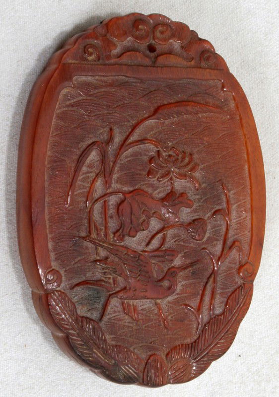 CHINESE CARVED RHINO HORN MEDALLION: CHINESE CARVED RHINO HORN MEDALLION, H 3", L 2":