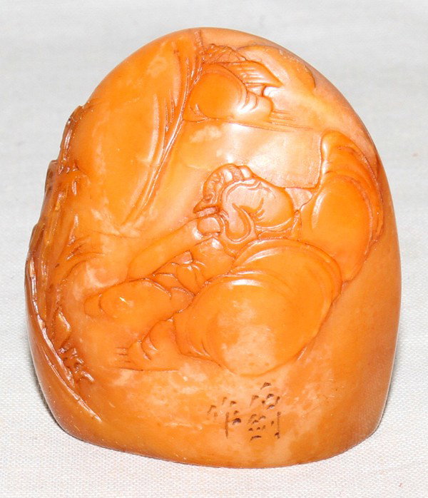 CHINESE TIAN HUANG STONE SEAL, H 1 3/4": CHINESE TIAN HUANG STONE SEAL, H 1 3/4":Featuring a seated man in the mountains.
