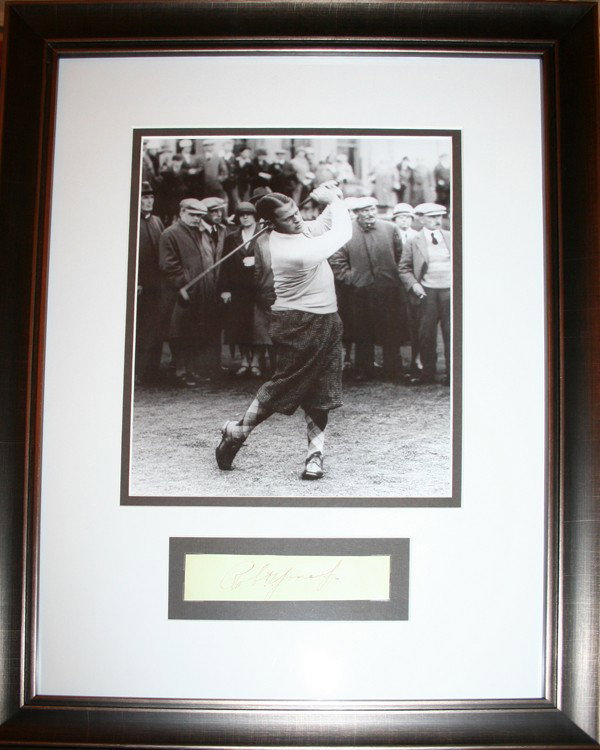 GOLFER BOBBY JONES CUT AUTOGRAPH W/PHOTO, H 12": GOLFER BOBBY JONES CUT AUTOGRAPH WITH BLACK & WHITE PHOTO, H 12", W 7":black and white photo depicts Bobby Jones hitting a golf ball with a cut signed autograph below the photo: 'Robert Jones Jr.', fr