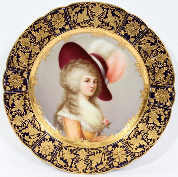 ROYAL VIENNA PORCELAIN PORTRAIT PLATE, : ROYAL VIENNA PORCELAIN PORTRAIT PLATE, 'DUCHESS OF DEVONSHIRE', SIGNED WAGNER, DIA 9 5/8":A highly decorated porcelain plate hand-painted at the well with a bust-length portrait of a fashionable young