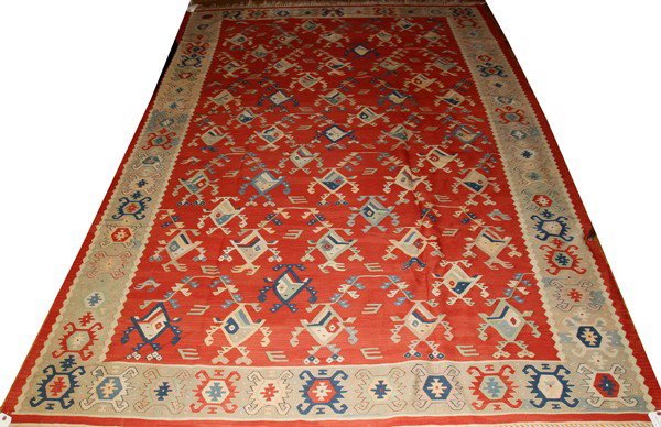 KELIM WOOL RUG, 6' 9" X 9' 11": KELIM WOOL RUG, 6' 9" X 9' 11":one wide beige border, light ground wand multi-colored geometric designs. Turkish.