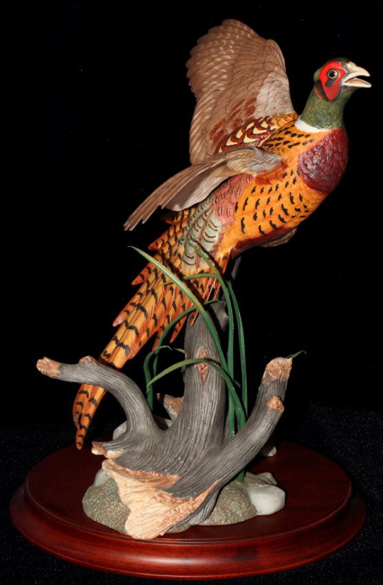 RUDISILL BISQUE FIGURE OF A RING NECK PHEASANT: RUDISILL BISQUE FIGURE OF A RING NECK PHEASANT, H 12", W 8":For the Franklin Mint, on a separate wood base.