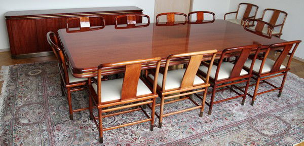 BRUETON MAHOGANY DINING SET: TABLE, 12 CHAIRS &: BRUETON MAHOGANY DINING SET: TABLE, 12 CHAIRS & CREDENZA, DESIGNED BY STANLEY JAY FRIEDMAN:Including 1 Radial credenza, H. 29", L. 96", D. 18"; 1Radial table, H. 29 1/2", W. 54", L. 108" and 12 "Tsu"