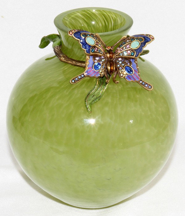 JAY STRONGWATER ENAMEL & GLASS VASE, H 6", : JAY STRONGWATER ENAMEL & GLASS VASE, H 6", DIA 5":Slightly mottled green glass vase is decorated with an enameled and bejeweled butterfly, on a ring, around the neck.