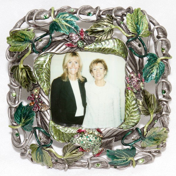 JAY STRONGWATER ENAMEL & PEWTER PHOTO FRAME: JAY STRONGWATER ENAMEL & PEWTER PHOTO FRAME:Having a woven style pewter frame that is enhanced by enamel in motifs of green leaves and vines with small jeweled frogs and insects perched all about the 