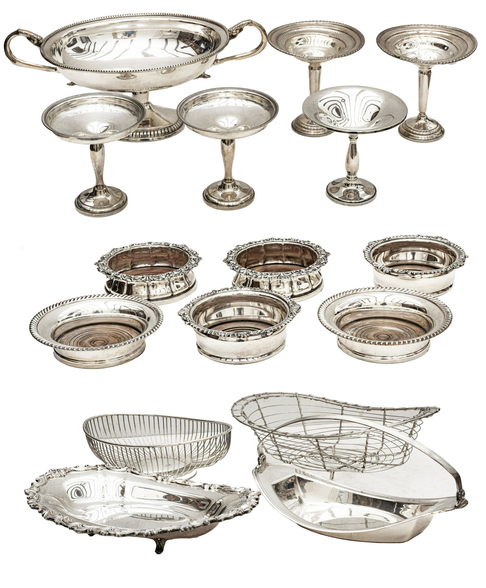 SILVER PLATE & WEIGHTED STERLING TAZZAS, BASKETS & WINE COASTERS, 16 PCS, H 2"-7.25": SILVER PLATE & WEIGHTED STERLING TAZZAS, BASKETS & WINE COASTERS, 16 PCS, H 2"-7.25" A collection of sixteen silver plated or weight sterling silver table articles. The weighted sterling silver compot