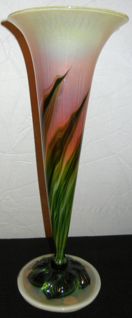 JAMES LUNDBERG ART GLASS VASE, H 15", DIA 6": JAMES LUNDBERG ART GLASS VASE, H 15", DIA 6":Trumpet form vase. Signed and dated 1990 #020632. Colors of rose, green, iridescent white with swirl forms.