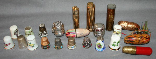 THIMBLE COLLECTION INCLUDING STERLING, ENAMEL: THIMBLE COLLECTION INCLUDING STERLING, ENAMEL, PORCELAIN; 19TH & 20TH C, 100+ PCS.:includes approx. twenty which are stamped: England, Austrian, German, American i.e.. Norman Rockwell; Approx. twenty-