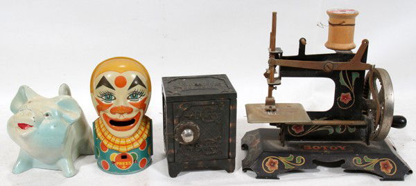 TIN & CAST IRON BANKS & A TOY SEWING MACHINE,: TIN & CAST IRON BANKS & A TOY SEWING MACHINE, FOUR PIECES, H 4" - 8":Including 3 banks, one tin litho bank in the form of a clown, one cast iron and one other in the form of a pig, H. 4" & 5 1/2" toge
