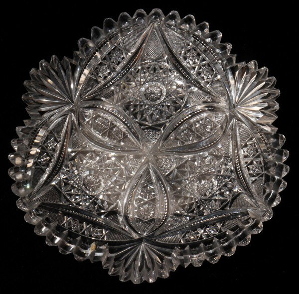 LIBBEY CUT GLASS DISH, C. 1900, DIA 6 3/4": LIBBEY CUT GLASS DISH, C. 1900, DIA 6 3/4":Cut three-petal motif at the well alternating with hobstars; signed. The Estate of George H. Gowen, Ottawa Hills, Ohio.