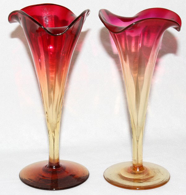 VICTORIAN AMBERINA GLASS VASES, 19TH C., TWO,: VICTORIAN AMBERINA GLASS VASES, 19TH C., TWO, H 6":Each hand-blown glass vase is of trumpet-form, shaded red to topaz. The Estate of George H. Gowen, Ottawa Hills, Ohio.