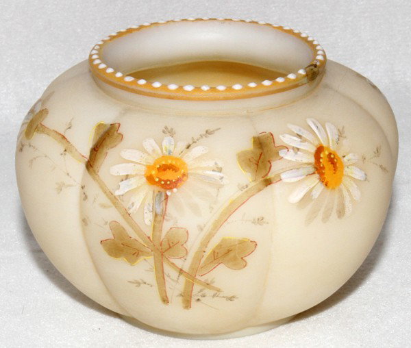 SMITH BROS. SATIN GLASS BUD VASE, C. 1910, : SMITH BROS. SATIN GLASS BUD VASE, C. 1910, H 2 1/4", DIA 3":Melon-form satin glass bud vase hand-painted with daisies on a buff color ground; stamped trademark in red at the underside (see additional 