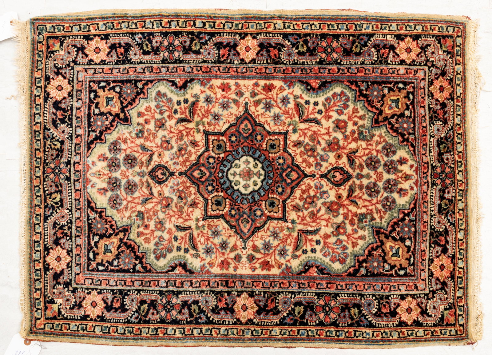 SAROUK PERSIAN WOOL MAT, C 1940 W 26" L 32": SAROUK PERSIAN WOOL MAT, C 1940 W 26" L 32" Ivory field, center medallion. All wool and hand woven.