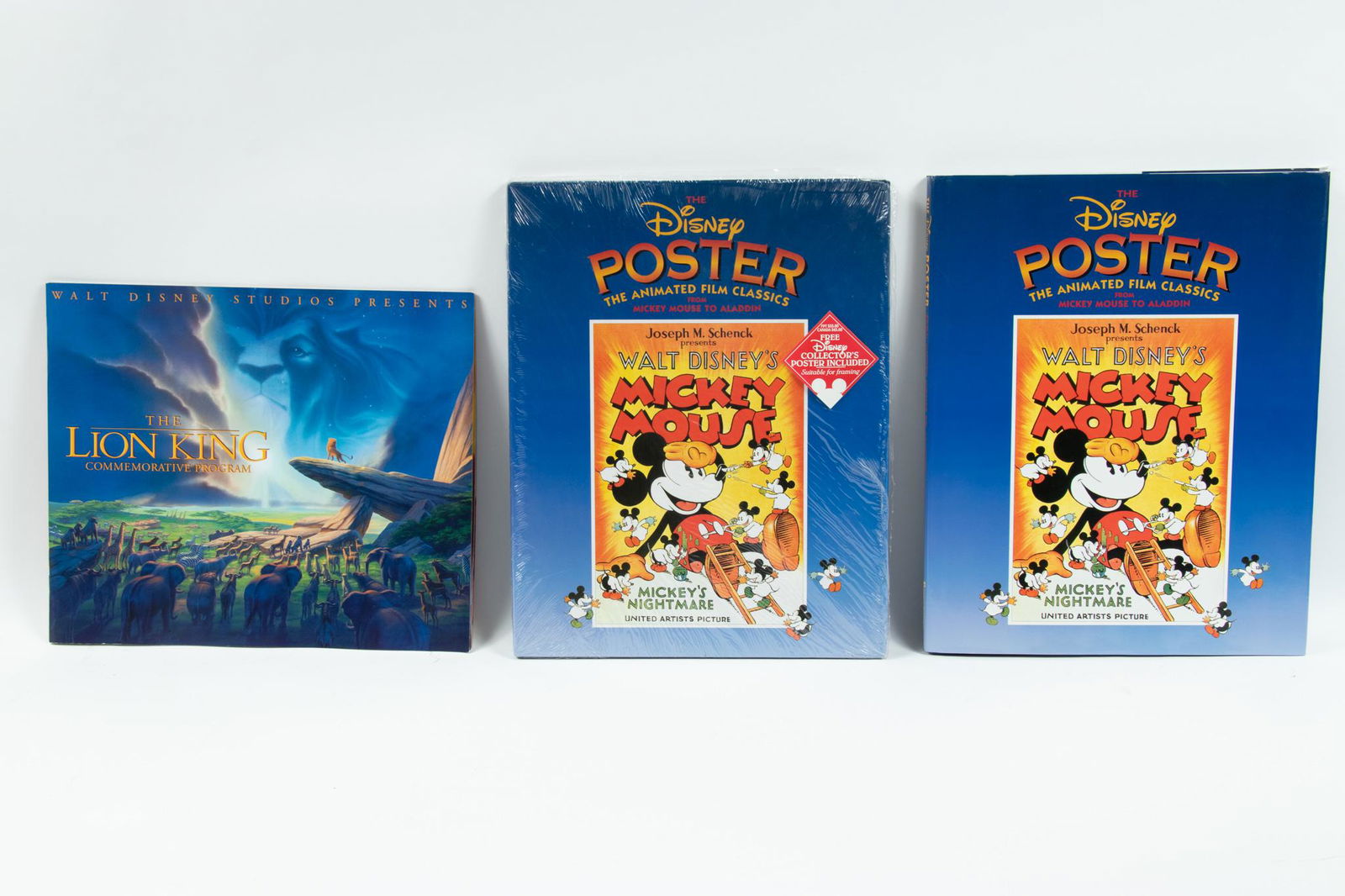 DISNEY ANIMATED FILM CLASSICS POSTER BOOKS AND LION KING COMMEMORATIVE PROGRAM, THREE PIECES (1 of 4)