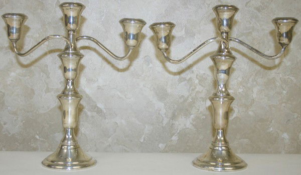 AMERICAN STERLING THREE-LIGHT CANDELABRA, PAIR: AMERICAN STERLING THREE-LIGHT CONVERTIBLE CANDELABRA, PAIR, H 9 1/2", W 9 1/2":both having turned spindle design shafts, two bent wire design arms; both convert to single lights.