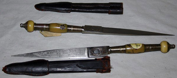 BRAZILIAN DAGGERS, PAIR, L 7" BLADES: BRAZILIAN DAGGERS, PAIR, L 7" BLADES:each having engraved straight blades inscribed in Portuguese: "Nao Me Ameaca" (Do Not Threaten Me) on one side and "Salve Patria" (save Patria) on the other also s