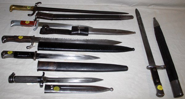 GERMAN, PRUSSIAN, SWISS AND SPANISH BAYONETS,: GERMAN, PRUSSIAN, SWISS AND SPANISH BAYONETS, PRE & POST WW1& WWII, 6 PCS., L 9" - 18" BLADES:includes: one S1871brass hilted bayonet with an 18" blade stamped "P.D. Uneschloss Solingen"; "19 R. E. 2.