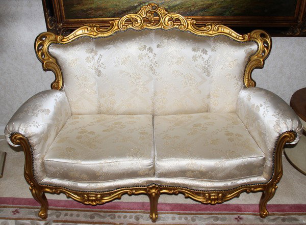 FRENCH GILT & SILK UPHOLSTERED SETTEE, L 56": FRENCH GILT & SILK UPHOLSTERED SETTEE, L 56":Scrolling gilt frame with silk upholstered back, scrolled arms, and two seat cushions.