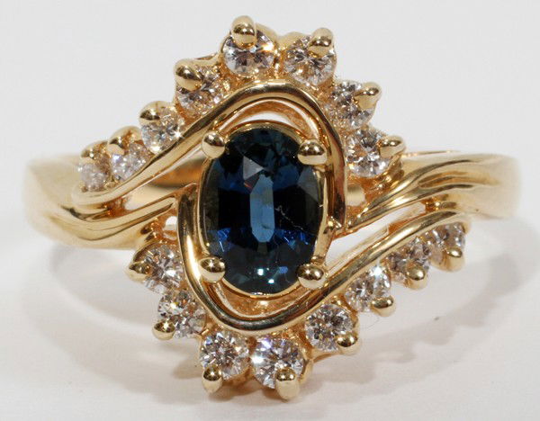 14KT Y/GOLD .54 CTS. SAPPHIRE & DIAMOND RING: 14KT YELLOW GOLD .54 CTS. SAPPHIRE & DIAMOND RING:Size 6 1/2. Sapphire .54 ct. Weight 4 grams
