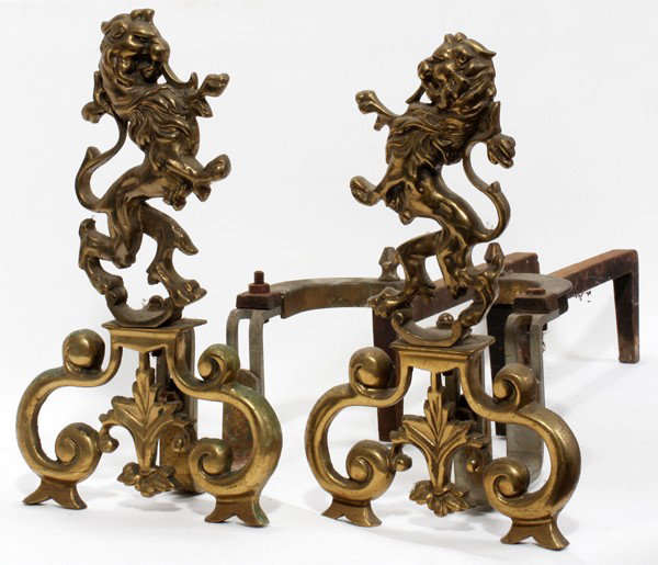 20TH C. BRASS ANDIRONS, PAIR, H 13", L 8": 20TH C. BRASS ANDIRONS, PAIR, H 13", L 8":Possibly English; pierced rampant lion form design.