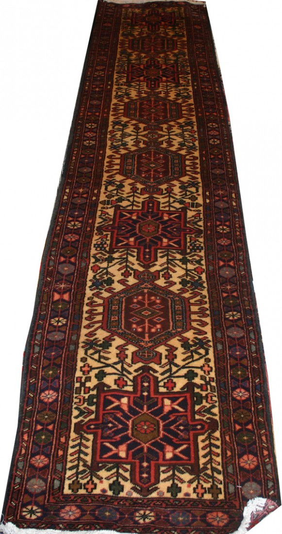 HERIZ PERSIAN RUNNER, 12' 9" X 2' 6": HERIZ PERSIAN RUNNER, 12' 9" X 2' 6":Circa 1980-90.