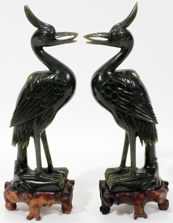 CARVED JADE BIRDS, PAIR, H 7 1/2": CARVED JADE BIRDS, PAIR, H 7 1/2":Spinach green jade. Plus carved wood stands. Size is jade only