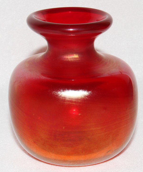 BRIAN LONSWAY ART GLASS BUD VASE, 1977, H 3": BRIAN LONSWAY ART GLASS BUD VASE, 1977, H 3":Red glass vase with iridescent sheen; signed and dated 6-23-77 at the underside. The Estate of George H. Gowen, Ottawa Hills, Ohio.