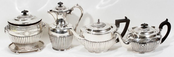 ENGLISH SHEFFIELD PLATE BISCUIT BOX & TEAPOTS,: ENGLISH SHEFFIELD PLATE BISCUIT BOX & TEAPOTS, FOUR PIECES:Mappin and Webb biscuit box H 7" W 7". Has bun feet, hinged lid, lion mount handles with loose rings, ebony finial, hand chased band. Also 8"