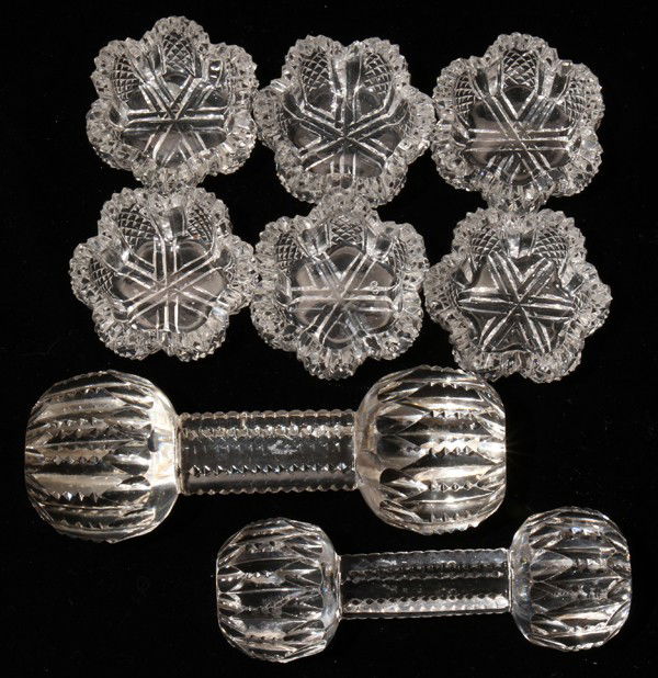 CUT GLASS KNIFE RESTS (2) & OPEN SALTS (6),: CUT GLASS KNIFE RESTS (2) & OPEN SALTS (6), C. 1900:Including 2 cut glass knife rests, L.4 1/4" and 5", and a set of 6 open salts, Dia.2". Eight pieces total. All antique American. The Estate of Georg