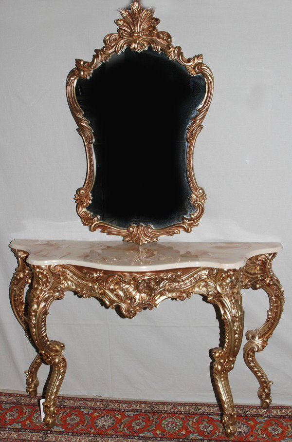 CARVED & GILT WOOD CONSOLE TABLE & MIRROR, : ROCOCO STYLE CARVED & GILT WOOD CONSOLE TABLE & MIRROR, H 79", L 54", D 16":Each piece is ornately fashioned, primarily with shell and scroll motifs, and gilded