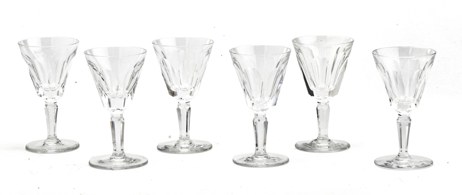 WATERFORD 'SHEILA' CUT CRYSTAL PORT WINE GLASSES, 12 PCS, H 4.5", DIA 2.5": WATERFORD 'SHEILA' CUT CRYSTAL PORT WINE GLASSES, 12 PCS, H 4.5", DIA 2.5" A collection of twelve Waterford 'Sheila' cut crystal port wine glasses. Offers six cut panels to the basins on a faceted ste