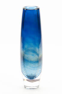 SVEN PALMQVIST FOR ORREFORS (SWEDISH) KRAKA ART GLASS VASE, H 12.75" DIA 4": SVEN PALMQVIST FOR ORREFORS (SWEDISH) KRAKA ART GLASS VASE, H 12.75" DIA 4" Clear glass encasing a blue inner with graal fish net interior design. Signed 'Orrefors 9582 40 Sven Palmqvist Kraka Gallery