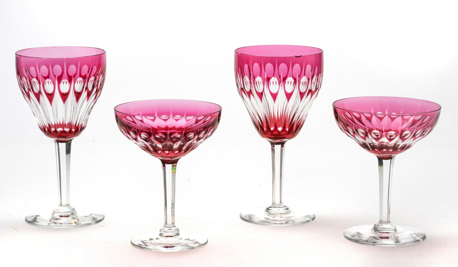 BOHEMIAN CUT-TO-CLEAR CRYSTAL STEMWARE, 28 PCS, H 5"-6.5": BOHEMIAN CUT-TO-CLEAR CRYSTAL STEMWARE, 28 PCS, H 5"-6.5" A 28-piece collection of Bohemian cut-to-clear crystal stemware. Includes twelve martini glasses (H 5"), eight port wine glasses (H 5.5"), and