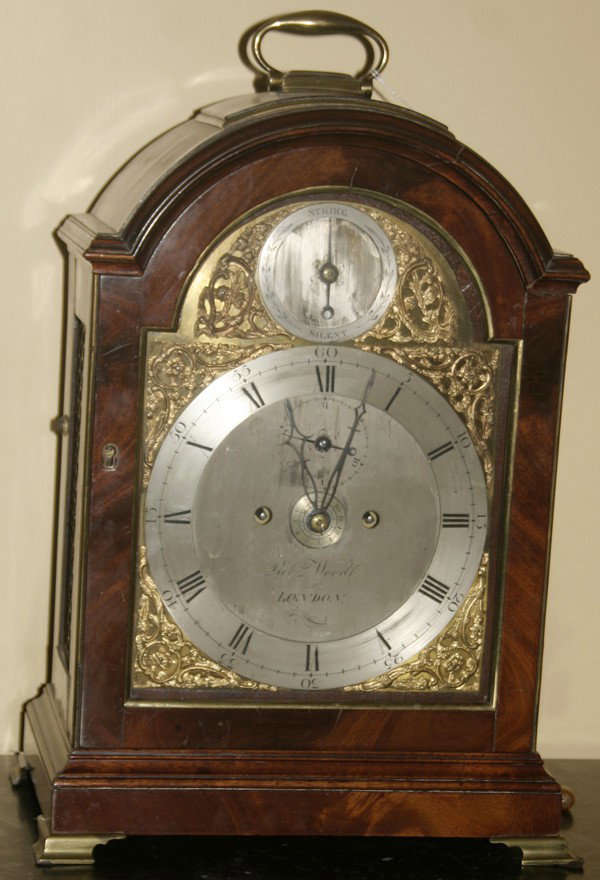 ENGLISH MAHOGANY BRACKET CLOCK, BY ROBERT WOOD: ENGLISH MAHOGANY BRACKET CLOCK, BY ROBERT WOOD, LONDON, C. 1800, H 18", W 11", D 8":burl wood veneer case; silent/strike dial at top, two-key wind, Roman numerals, day dial at XII, month dial at cente