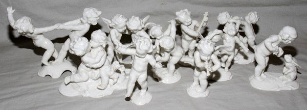 HUTCHENREUTHER PORCELAIN FIGURES OF CHERUBS: HUTCHENREUTHER PORCELAIN FIGURES OF CHERUBS, TEN, H 4":depicts figures dancing, playing instruments, embracing and playing with animals; All white. #145.