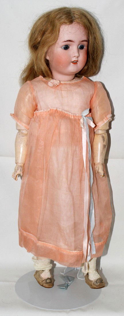 ALT, BECK & GOTTSCHALCK BISQUE HEAD DOLL, H 23": ALT, BECK & GOTTSCHALCK BISQUE HEAD DOLL, H 23":Doll with bisque head, composition jointed body, sleep eyes and open mouth. Incised "A.B. & G Made in Germany" on the back of the head.