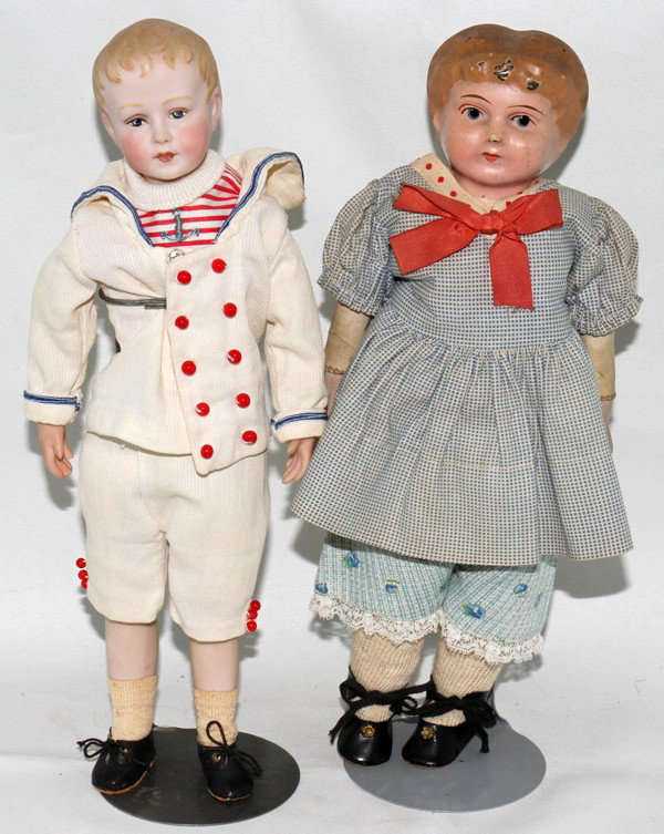 GERMAN METAL DOLL & BERGER 'WEE DUKE' BY MARCY: GERMAN PAINTED METAL DOLL & BERGER 'WEE DUKE' BY MARCY, TWO, H 10 3/4":Including 1 German painted metal doll with kid body and bisque arms, c. 1888, and 1 other Berger "Wee Duke" by Marcy, with bisque